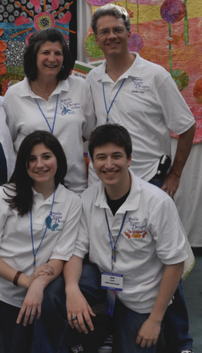 Amelie Scott Designs About Us - family photo at first Quilt Market